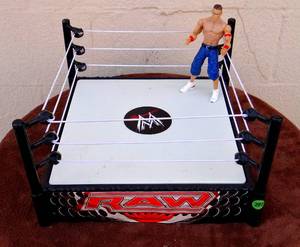 lot 292 image: Mattel WWE WWF RAW Smackdown Wrestling Ring Arena Spring Loaded 2010 with Action Figure
