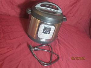 lot 20 image: INSTANT POT ELECTRIC PRESSURE COOKER.
