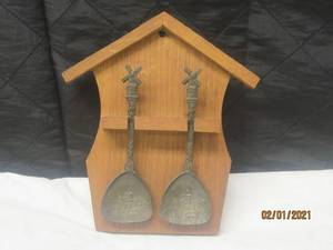 lot 83 image: HAND CARVED WOODEN DUTCH&nbsp HOUSE SPOON RACK WITH 2 SILVER&nbsp SOUVENIR&nbsp &nbspWINDMILL SPOONS