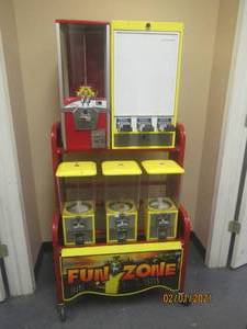 lot 86 image: FUNZONE 5 UNIT TOYCANDY VENDING MACHINE ON WHEELS WITH KEY&nbsp