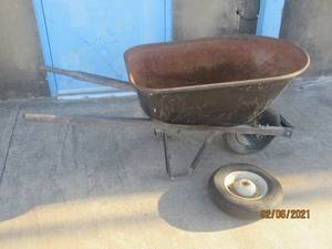 lot 203 image: TRUE TEMPER BY JACKSON WHEEL BARROW WITH EXTRA TIRE&nbsp
