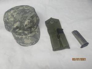 lot 289 image: 4PC MILITARY LOT 2 CLIPS WITH HOLDER&nbsp AND PATROL CAP SIZE 7 12&nbsp