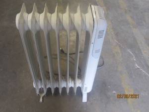 lot 357 image: LAKEWOOD HEATER NEED FOOT REPLACEMENT WHEELS