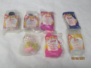 lot 376 image: TOAL OF 7 VINTAGE MC DONALDS BARBIE HAPPY MEAL TOYS -UNOPEN