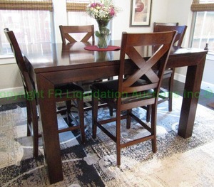 lot 128 image: Steve Silver company dining table and 4 matching chairs, table has hide-away leaf