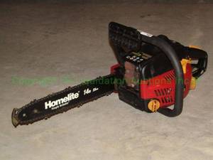 lot 143 image: Homelite gas powered chain saw