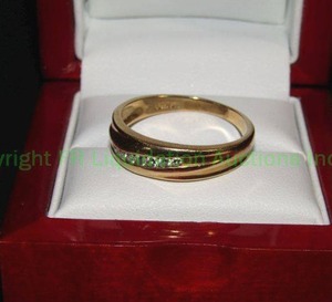 lot 148 image: stamped 14K FG (fine gold) diamond chip wedding band