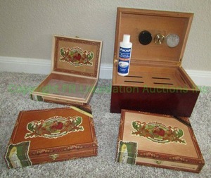 lot 168 image: Cigar humidor plus and wood cigar boxes