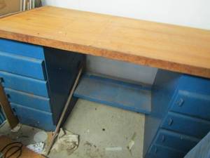 lot 407 image: METALWOOD WORK BENCH  HAS 2  FOUR DRAWER METAL CABINETS  60 L X 36H X 28D WOOD TOP IS 2 THICK