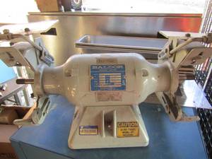 lot 9 image: BALDOR 12HP TABLE GRINDER