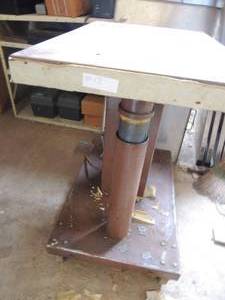 lot 13 image: Metal lift table 33x30x20 lowered  Foot pump 500 lb. capacity