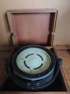 lot 132 image: . U.S. Navy Ship COMPASS  in wooden case Box 14x14  The Liorele Corp