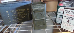 lot 135 image: 2 cans smokeless powder  (DUPONT IMR-4220, 4350),  2 army green ammo boxes  and empty shells