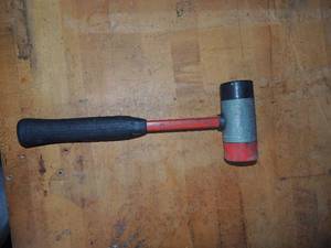 lot 148 image: 13 double sided rubber red and black  hammers in tub
