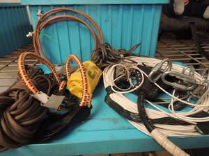 lot 210 image: Blue tote full of string wire B$W bracket caution tape