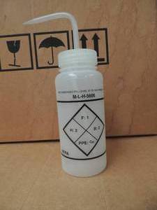 lot 214 image: Box of lab chemical bottles with nozzle
