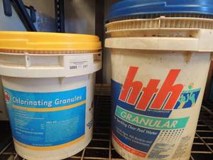 lot 217 image: 2 -5 gallon jugs of HTH chlorine for pool cleaning (used)