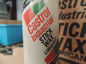 lot 221 image: 24 tubes of Casterol industrial stick wax lube