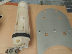 lot 226 image: 3 silicone waffer filters and a metal piece