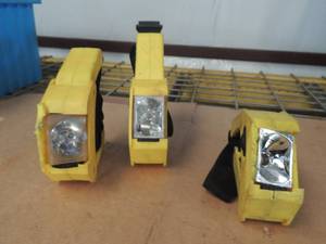 lot 253 image: 6 yellow head fllashlights some with broken lenses