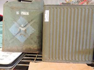 lot 389 image: Metal Navy 5 gallon gas cans (1 has rusted bottom)  1 square Army can Nablitt Sparks Inc� Feb. 26, 1942