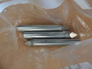 lot 513 image: 4 one inch punches