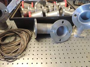 lot 550 image: Black tub of thick metal fittings 3 10x6 & 13 4x5