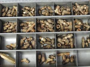 lot 566 image: Brass connectors in gray metal box