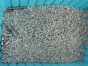 lot 597 image: Blue tub star head oval screws