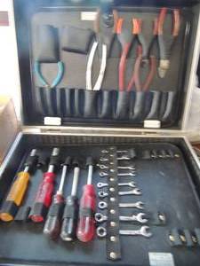 lot 621 image: Silver tool box full of tools carrying case plyers, wrenches and screwdrivers etc.