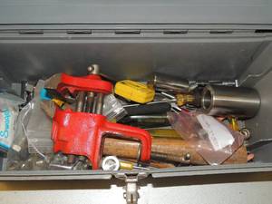 lot 729 image: Gray toolbox with screw drivers, clamps, hammer handels bolts sockets and more