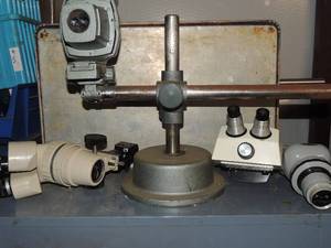 lot 763 image: Olympus Tokyo 316851 Microscope on stand 3 other lenses Nikon Microscope