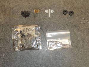 lot 778 image: Electrical components air caps, brackets,balance springs, screws, nuts and 2 bags black shut off nobs