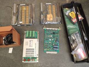 lot 785 image: black caddy with electrical components motherboards AC power adaptor with screen