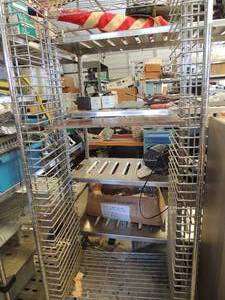 lot 843 image: Metal rolling cart no shelving units 68x29x18