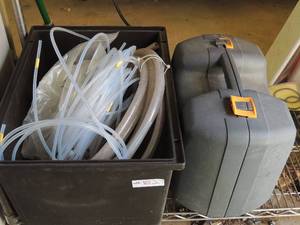 lot 852 image: Gray tool case empty black tub of tubing