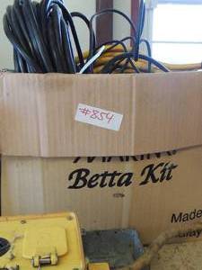 lot 854 image: Assorted wires, plugs, power box, yellow 125 grounding box