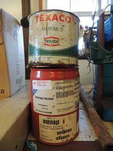 lot 855 image: 1 can of used Isopropyl Alcohol 1 can used  Mark far o Texaco brand