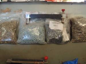 lot 895 image: Metal tool box with screws nails bolts and liquid levels