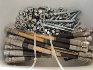 lot 900 image: Air hose ends and large bolts and nuts