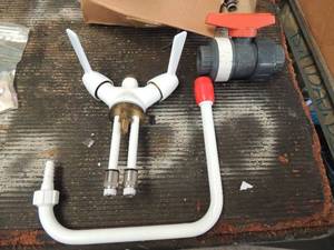 lot 944 image: Eyewash station hardware parts