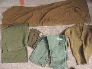 lot 910 image: Navy blanets and scarves   1 pair of large pants