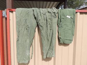 lot 916 image: 2 pair Army trousers size medium  and mens size 44 large flight suit