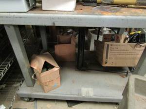 lot 965 image: Heavy duty work table on wheels  NO CONTENTS