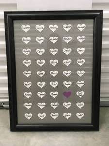 lot 168 image: Black frame with Inspiration Hearts