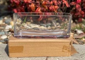 lot 13 image: Glass Long & Low Flowergreenery Planter in box