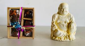 lot 33 image: Resin Buddha and Gift Tea set
