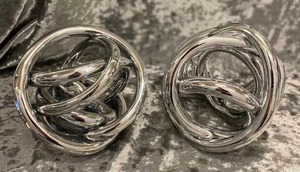 lot 573 image: Silver Glass Knots (2)
