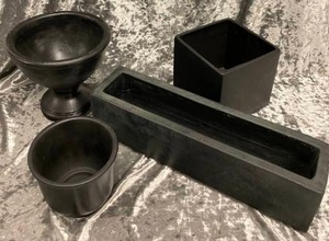 lot 535 image: Concrete Black 4 piece Planter Set