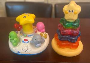 lot 199 image: V-Tech Spin and Learn Top and Fisher Price Toy
